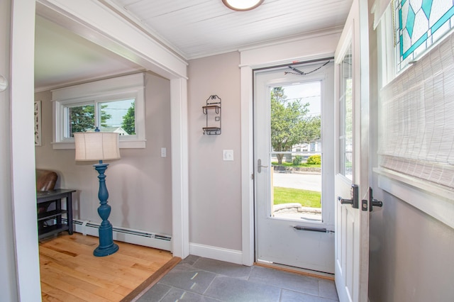 1 Madison St, Augusta, ME 04330 - foyer entrance with baseboard heating, healthy amount of natural light, and ornamental molding