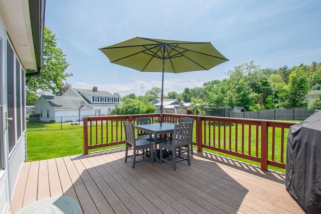 1 Madison St, Augusta, ME 04330 - wooden deck with outdoor dining space, a fenced backyard, grilling area, and a residential view