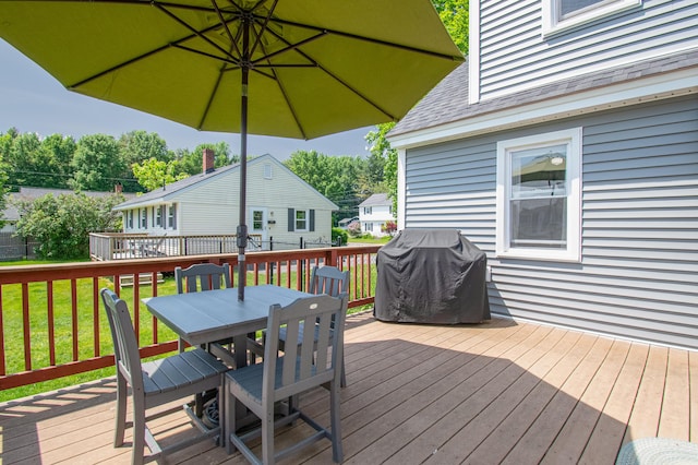 1 Madison St, Augusta, ME 04330 - wooden deck with a grill, outdoor dining area, and a lawn