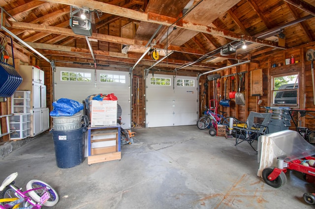 1 Madison St, Augusta, ME 04330 - garage featuring a garage door opener