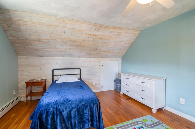 1 Madison St, Augusta, ME 04330 - bedroom featuring baseboard heating, lofted ceiling, wood finished floors, ceiling fan, and wooden walls