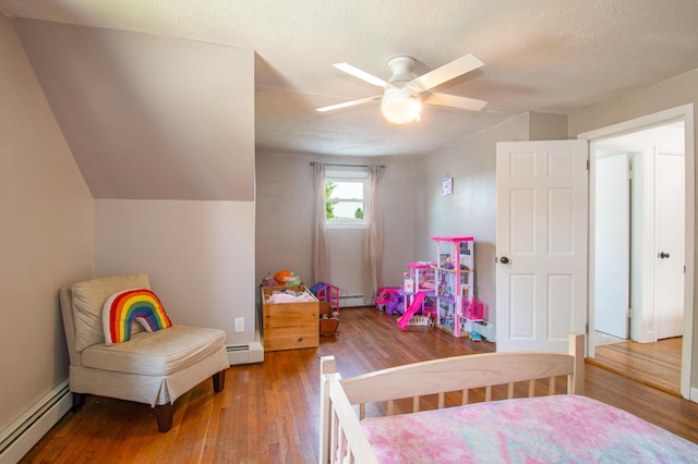 1 Madison St, Augusta, ME 04330 - bedroom with a baseboard heating unit, hardwood / wood-style flooring, ceiling fan, and lofted ceiling