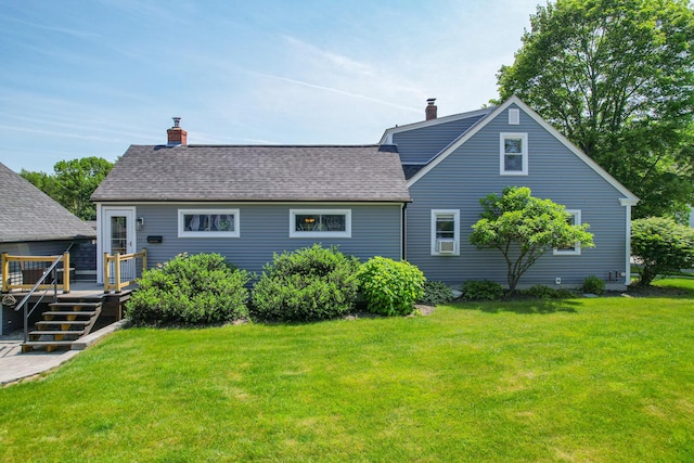 1 Madison St, Augusta, ME 04330 - rear view of property with a wooden deck, a yard, a chimney, and a shingled roof
