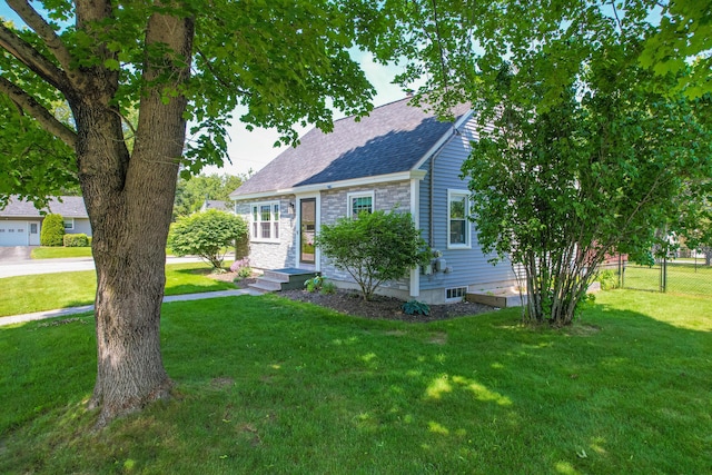 1 Madison St, Augusta, ME 04330 - view of front of property with roof with shingles and stone siding