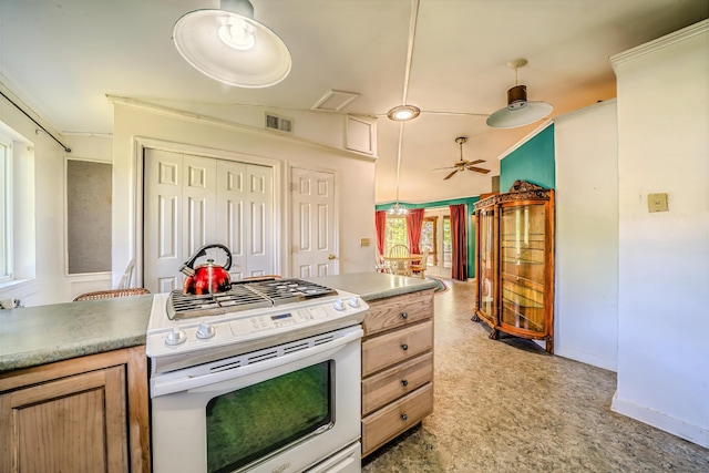 31 Herrick Rd, Belfast, ME 04915 - kitchen with white range with gas stovetop and a ceiling fan