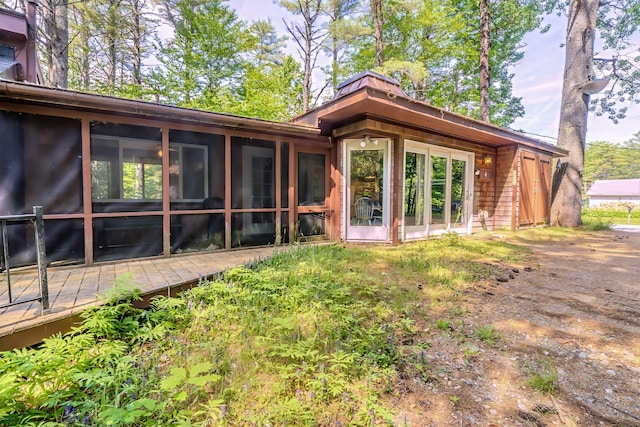 31 Herrick Rd, Belfast, ME 04915 - back of house with a sunroom and a deck