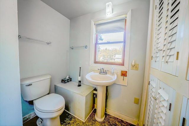 31 Herrick Rd, Belfast, ME 04915 - bathroom with toilet and baseboards