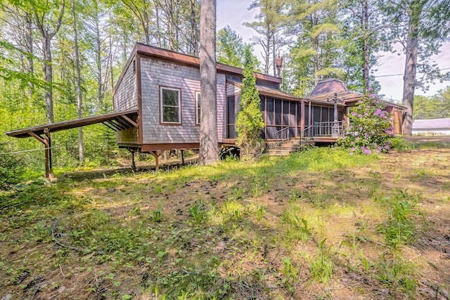 31 Herrick Rd, Belfast, ME 04915 - back of property featuring a sunroom