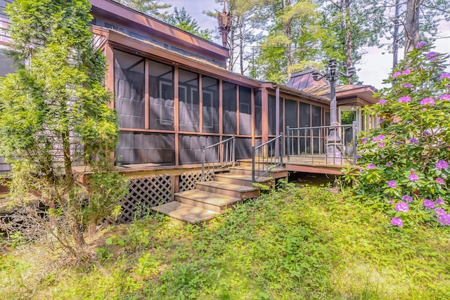 31 Herrick Rd, Belfast, ME 04915 - back of property featuring a sunroom