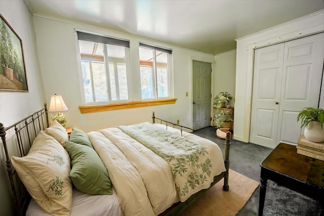 31 Herrick Rd, Belfast, ME 04915 - bedroom featuring a closet, ornamental molding, and carpet flooring