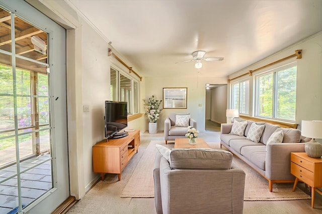 31 Herrick Rd, Belfast, ME 04915 - living room featuring a ceiling fan and baseboards