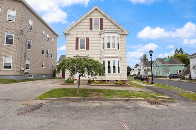 37 Cook St, Auburn, ME 04210 - view of front of home with asphalt driveway