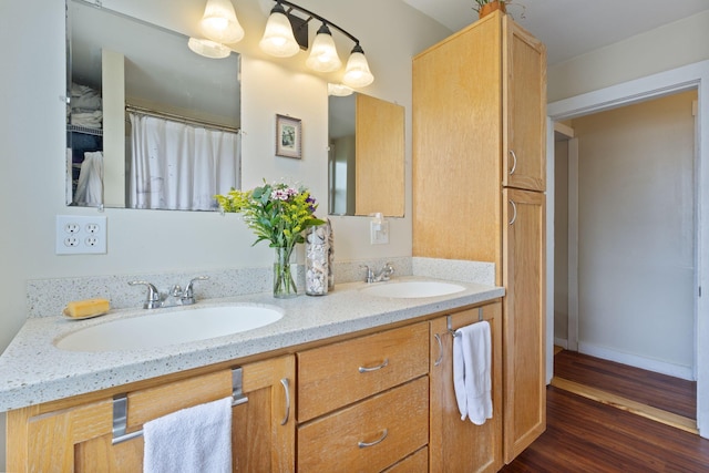 37 Cook St, Auburn, ME 04210 - full bath with double vanity and wood finished floors
