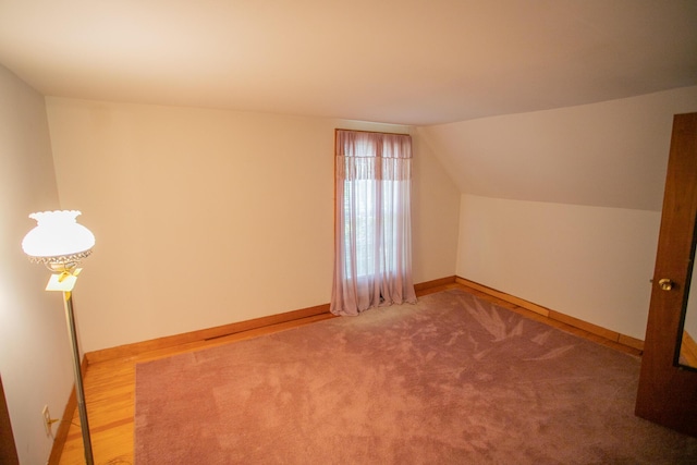 142 Military Rd, Greenbush, ME 04418 - additional living space featuring vaulted ceiling and carpet floors