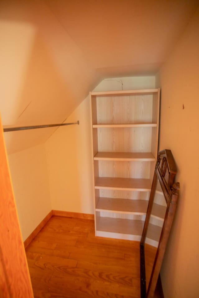 142 Military Rd, Greenbush, ME 04418 - walk in closet with wood finished floors and lofted ceiling