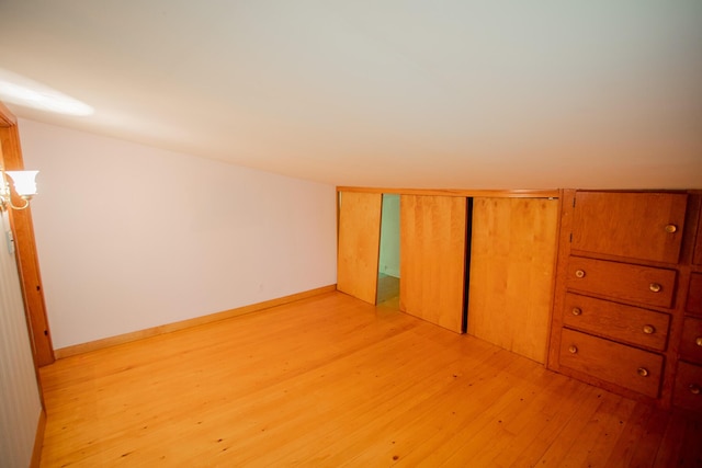 142 Military Rd, Greenbush, ME 04418 - unfurnished bedroom with light wood finished floors and a closet