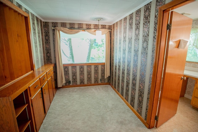 142 Military Rd, Greenbush, ME 04418 - spare room with wallpapered walls and healthy amount of natural light
