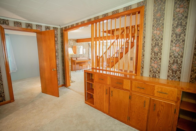 142 Military Rd, Greenbush, ME 04418 - hallway featuring stairs and light carpet