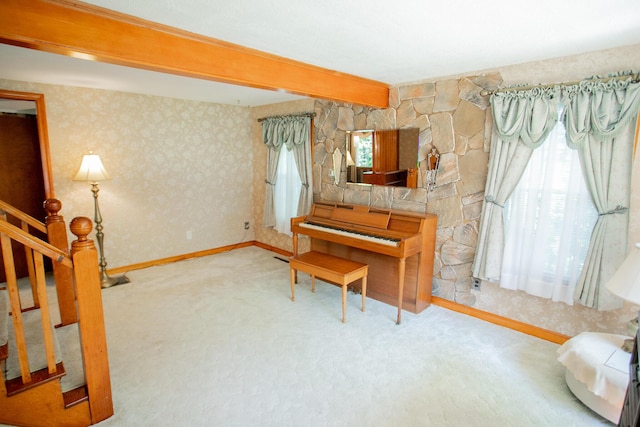 142 Military Rd, Greenbush, ME 04418 - living area with carpet, stairs, and wallpapered walls