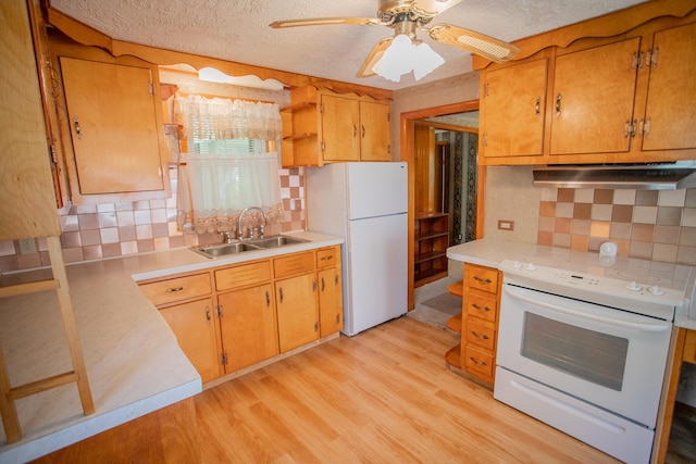 142 Military Rd, Greenbush, ME 04418 - kitchen with white appliances, under cabinet range hood, decorative backsplash, light countertops, and a textured ceiling