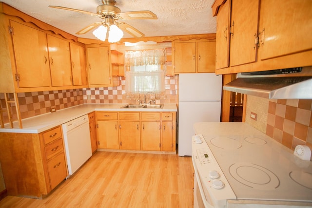 142 Military Rd, Greenbush, ME 04418 - kitchen with white appliances, range hood, backsplash, light countertops, and a textured ceiling