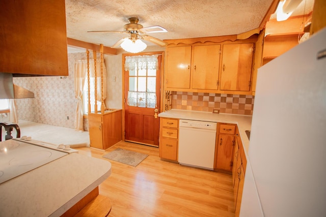 142 Military Rd, Greenbush, ME 04418 - kitchen featuring white appliances, a ceiling fan, light countertops, light wood finished floors, and a textured ceiling