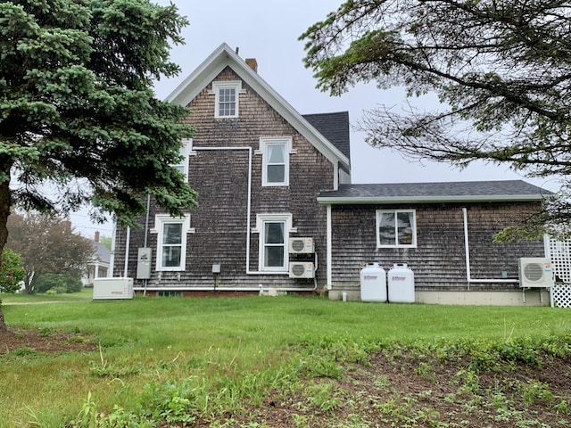 361 Water St, Addison, ME 04606 - rear view of property with a chimney and a shingled roof