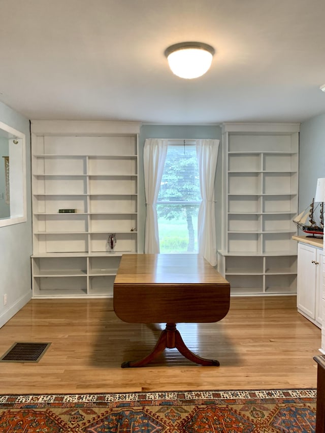 361 Water St, Addison, ME 04606 - dining room featuring light wood-style flooring and built in shelves