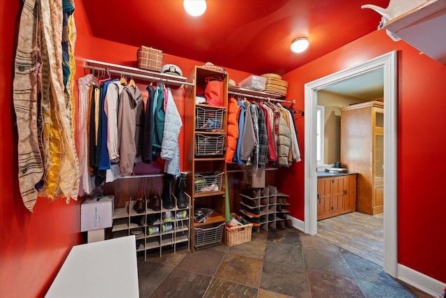 41 Main St, Old Town, ME 04468 - walk in closet featuring stone finish floors