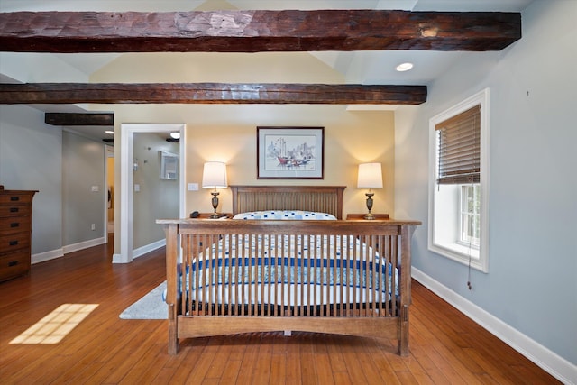 41 Main St, Old Town, ME 04468 - bedroom with hardwood / wood-style flooring and beam ceiling