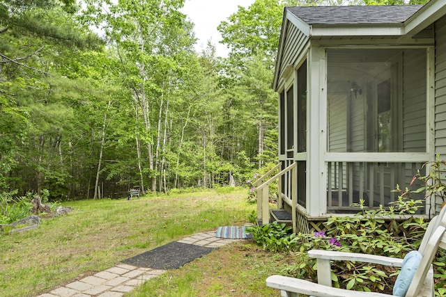17 Eagle Ln, Damariscotta, ME 04543 - view of yard featuring a sunroom and a wooded view