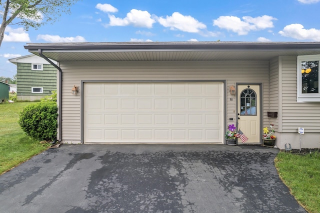 8 Grovemount Ln, Lewiston, ME 04240 - garage featuring driveway