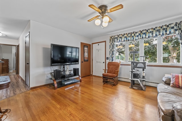 8 Grovemount Ln, Lewiston, ME 04240 - living room featuring ceiling fan, light wood-style floors, and baseboard heating