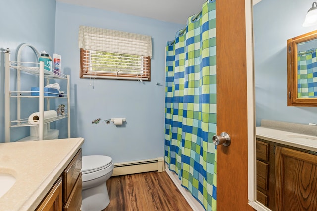 8 Grovemount Ln, Lewiston, ME 04240 - full bath with baseboard heating, vanity, wood finished floors, and a shower with curtain