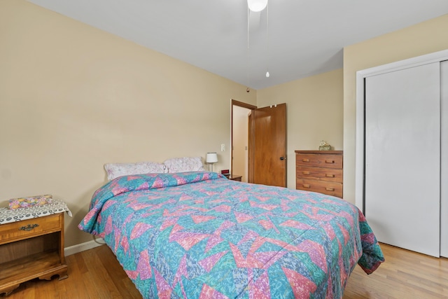 8 Grovemount Ln, Lewiston, ME 04240 - bedroom featuring wood finished floors, a closet, and ceiling fan