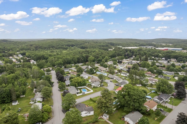 8 Grovemount Ln, Lewiston, ME 04240 - aerial overview of property's location featuring a heavily wooded area and nearby suburban area