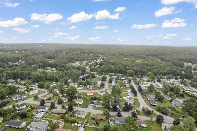 8 Grovemount Ln, Lewiston, ME 04240 - aerial perspective of suburban area with a heavily wooded area