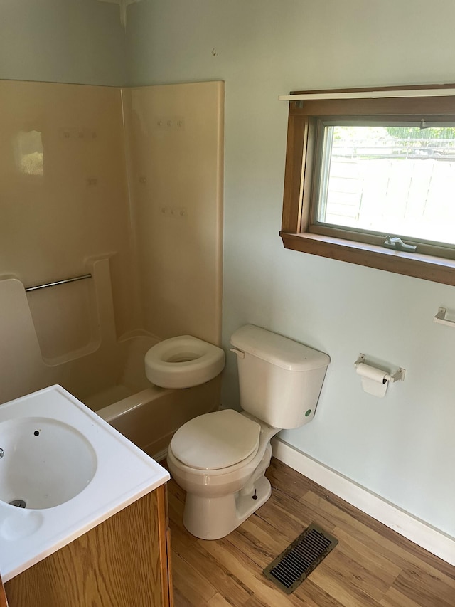 1431 Indian River Rd, Addison, ME 04606 - full bathroom with wood finished floors, a shower, and vanity