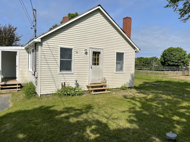 1431 Indian River Rd, Addison, ME 04606 - back of house with a chimney and entry steps