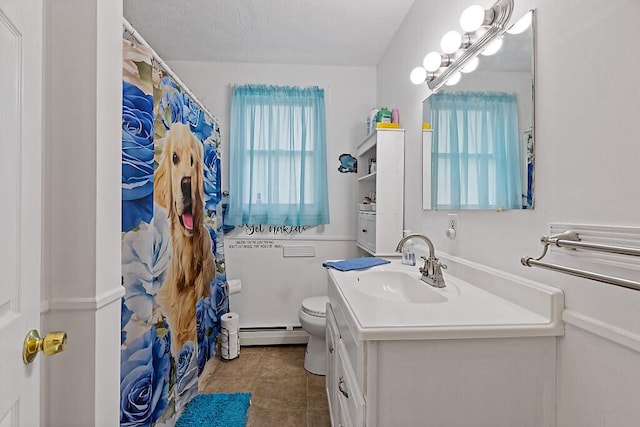 154 Rideout Ave, Lewiston, ME 04240 - bathroom with a baseboard heating unit, vanity, tile patterned flooring, and a shower with shower curtain