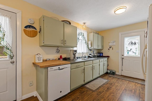 154 Rideout Ave, Lewiston, ME 04240 - kitchen with white dishwasher, dark wood finished floors, and dark countertops