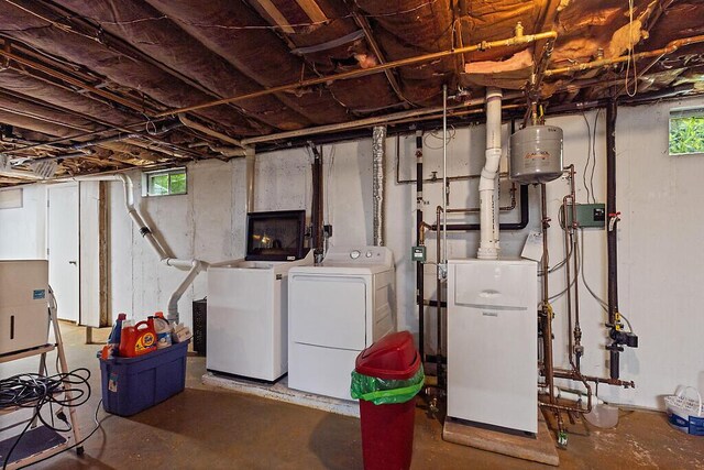 154 Rideout Ave, Lewiston, ME 04240 - below grade area featuring separate washer and dryer and healthy amount of natural light