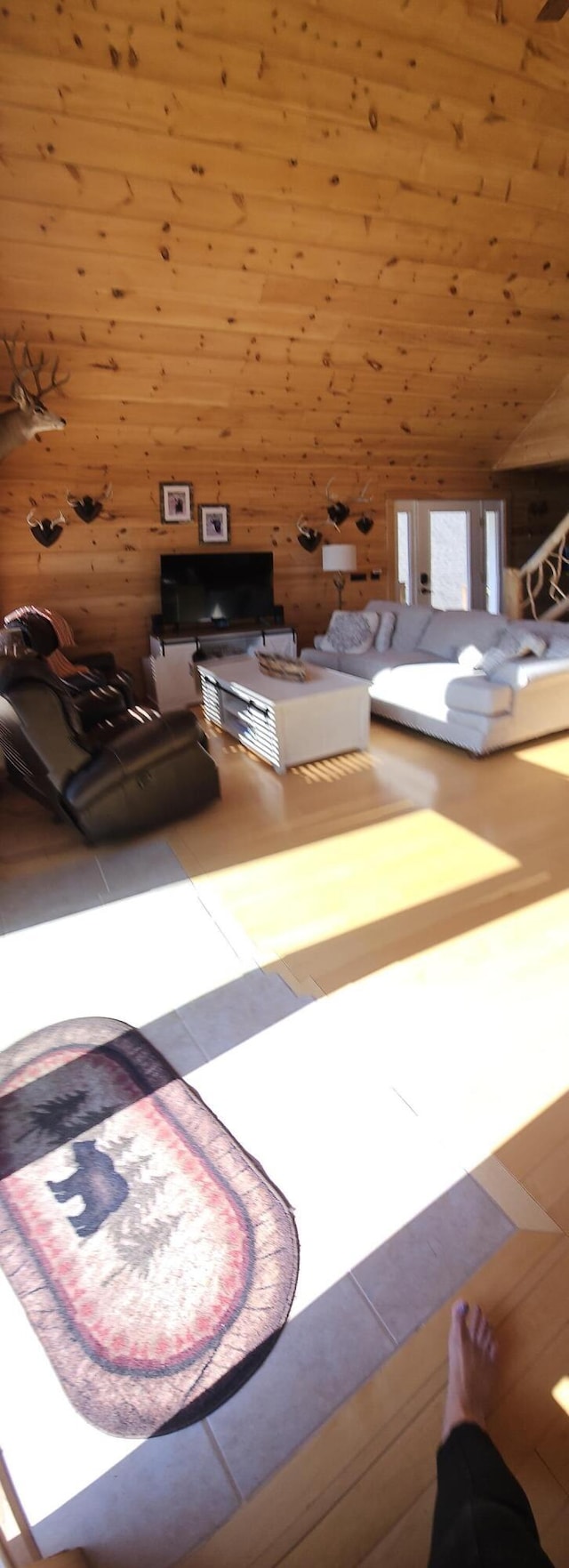 67 Upper Narrows Rd, Long Pond Twp, ME 04945 - living area featuring wood walls