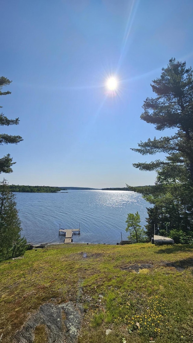 67 Upper Narrows Rd, Long Pond Twp, ME 04945 - water view featuring a dock