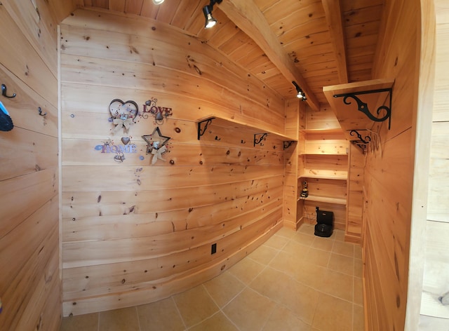 67 Upper Narrows Rd, Long Pond Twp, ME 04945 - corridor with tile patterned floors, wooden walls, a wooden ceiling with exposed beams, a relaxing sauna, and track lighting