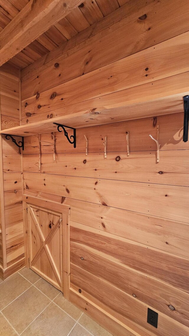 67 Upper Narrows Rd, Long Pond Twp, ME 04945 - mudroom with light tile patterned floors