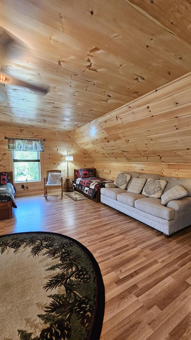 67 Upper Narrows Rd, Long Pond Twp, ME 04945 - living room featuring wood finished floors, wood ceiling, and wood walls