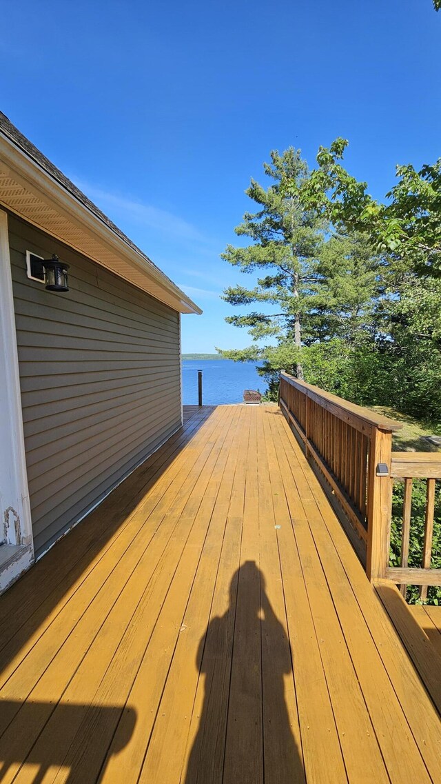 67 Upper Narrows Rd, Long Pond Twp, ME 04945 - wooden deck featuring a water view