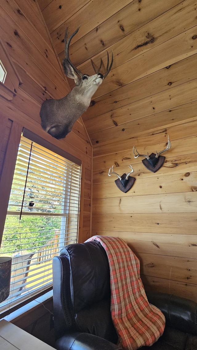 67 Upper Narrows Rd, Long Pond Twp, ME 04945 - living area featuring wood walls