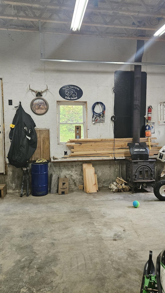 67 Upper Narrows Rd, Long Pond Twp, ME 04945 - garage featuring a workshop area